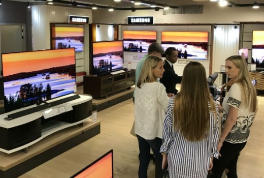 sales staff helping customers